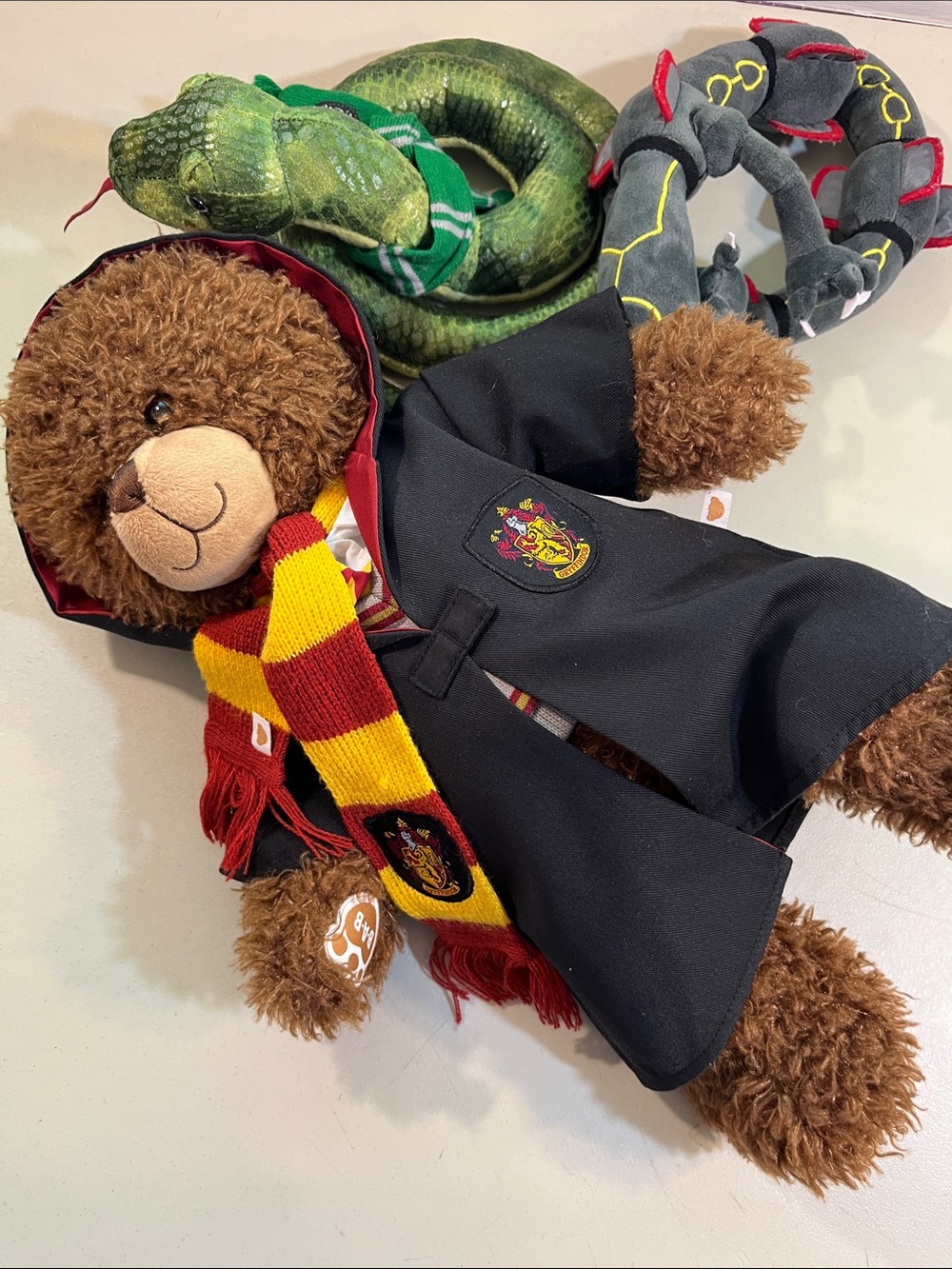 Plush Teddy Bear in Black Robe with Red & Yellow Scarf